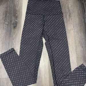 Lululemon Athletica Black and Gray Lettered Leggings